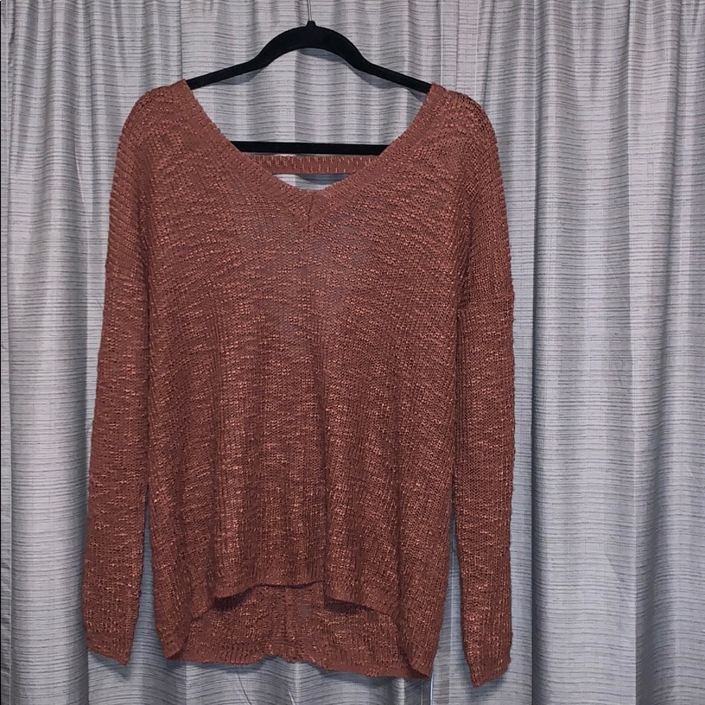 light red sweater